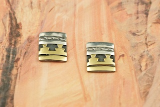 Sterling Silver Post Earrings with 12K Gold fill Pueblo Design. Created by Navajo Artist Tommy Singer. Signed by the artist.